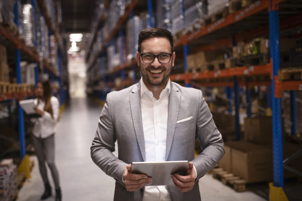 Fulfillment Warehouse Owner Greeting a New Customer