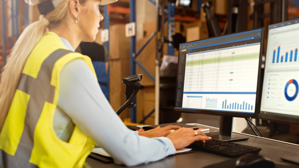 Woman Utilizing a Warehouse Management System