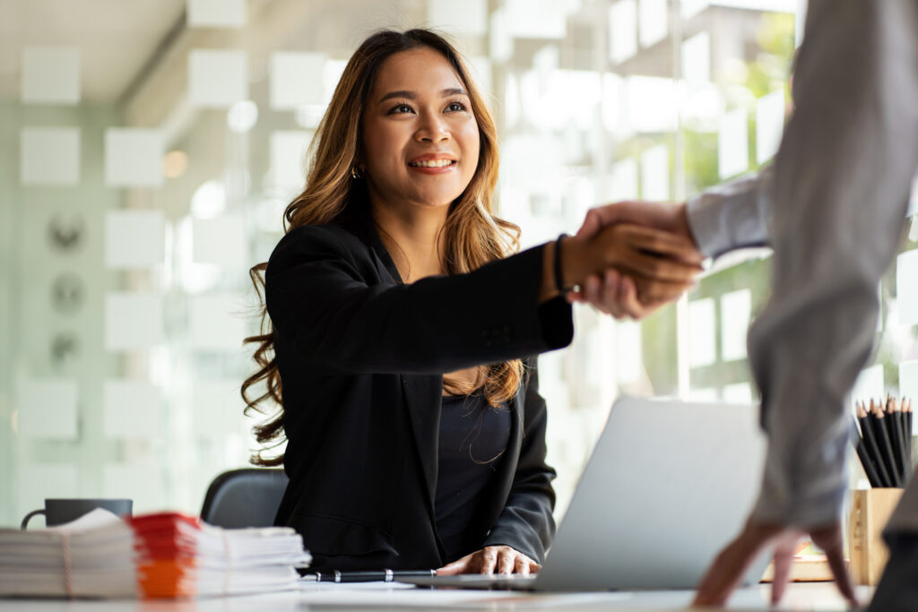 Fulfillment Company Shaking Hands with a eCommerce Business Owner