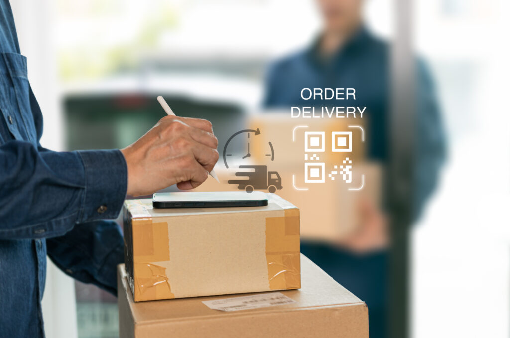 Order fulfillment in action with a package being set up for delivery.