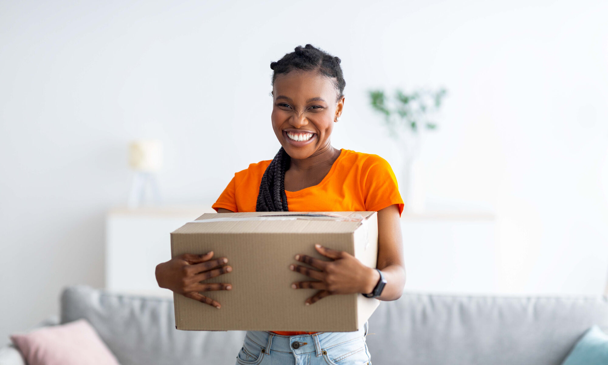 An excited business owner looking forward to partnering with an order fulfillment provider