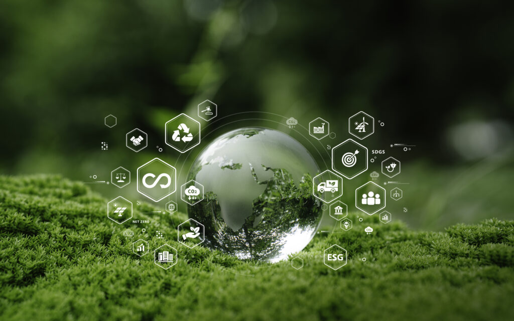 Crystal globe glass on green in forest with icon of Sustainable Development, green business, circular economy, supply chain, . renewable energy, carbon emission to net zero. Earth Day, and ESG concept